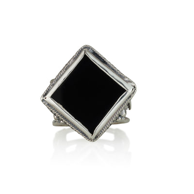 Silver ring inlaid with a rhombic and flat stone